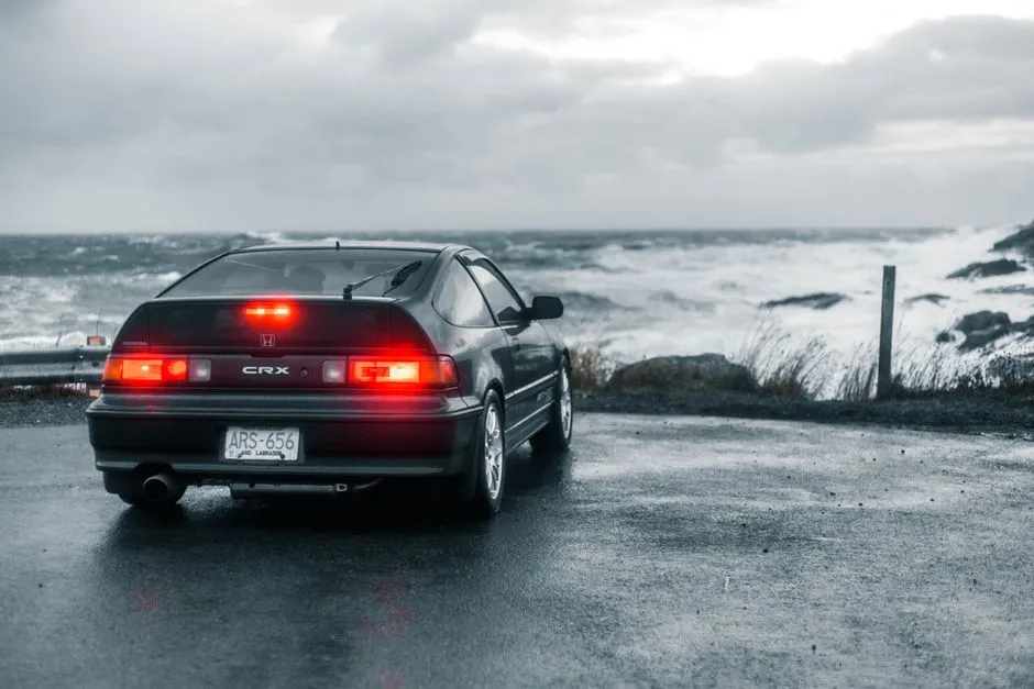car parked near the Cairns coast where salt air settles on the paint