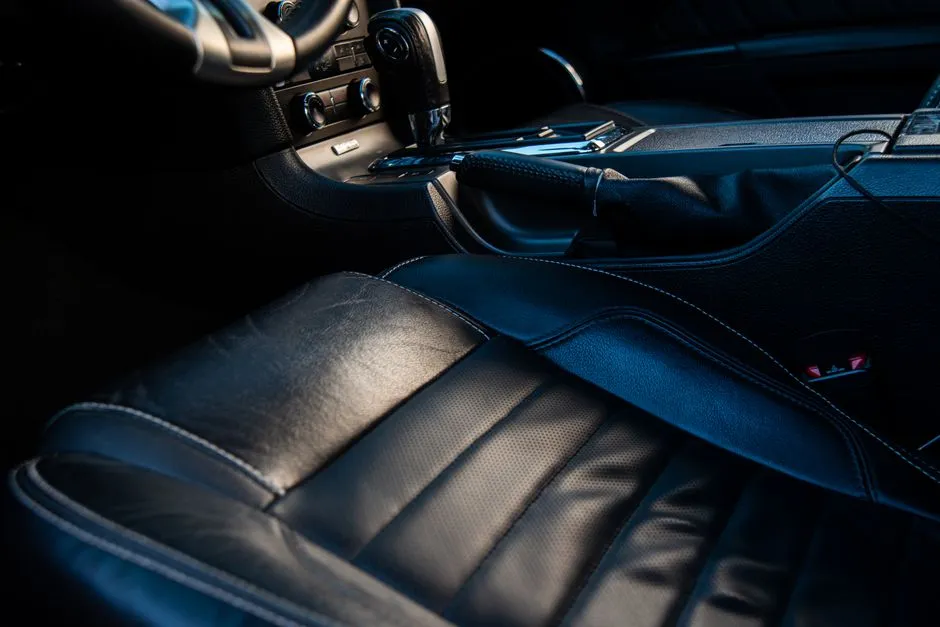 buyer inspecting a clean fresh car interior with detailed dashboard and seats